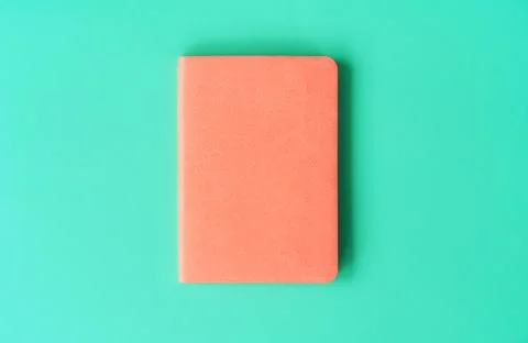 Orange diary for 2020 on a mint background. New Year concept in trendy colors. Stock Photos