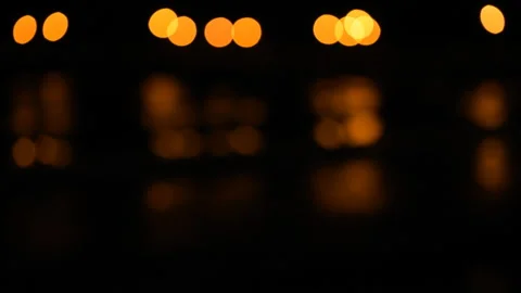 Orange discs on the black with reflections in water Stock Footage 88194861