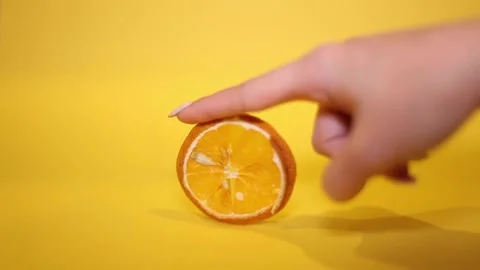 Orange dried on a yellow background. 動画素材 122370955