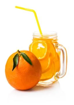 Orange drink in a jar Stock Photos