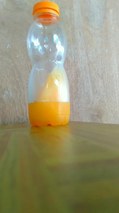 Orange Drink In A Plastic Bottle At Summer Stock Footage 156012226