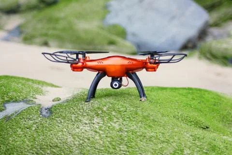 Orange drone on the beach Stock Photos