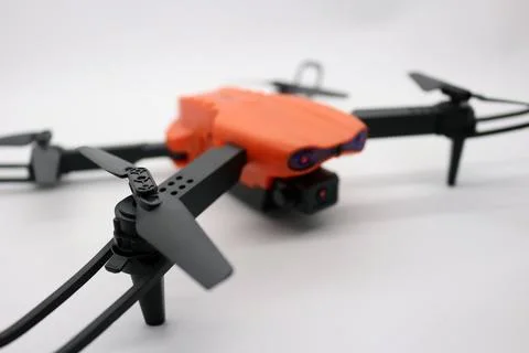Orange drone with camera Stock Photos
