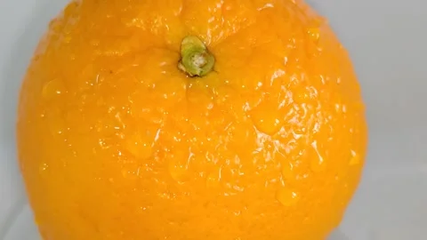 Orange in drops of water Stock Footage 330969821