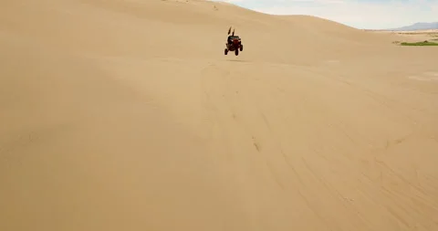 Orange Dune Buggy Getting Air in Desert in Zion National Park Video stock 247299500