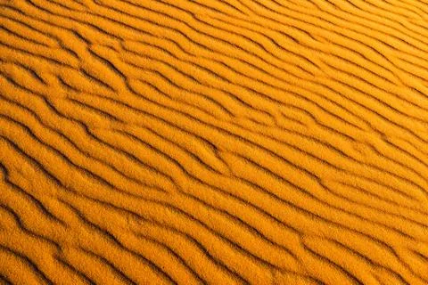 Orange dune waves pattern background of Sahara Desert, Merzouga, Morocco, Afr Foto stock