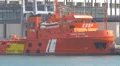The orange EGSP ship moored in the port of Barcelona 4k or 4k+ Resolution