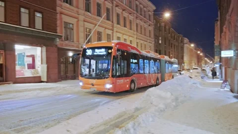 The orange electric city bus is moving. Stock Footage 170458317