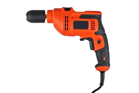 Orange electric drill with cable isolated on white Stock Photos