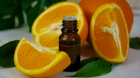 Orange essential oil in a bottle. Selective focus. Stock Footage 197026113