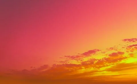 Orange evening sky at sunset. Gradient color. Sky texture. Abstract nature .. Stock Photos