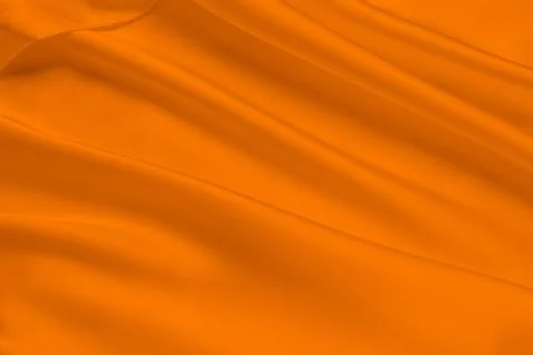 Orange fabric texture background, detail of silk or linen pattern. Stock Photos