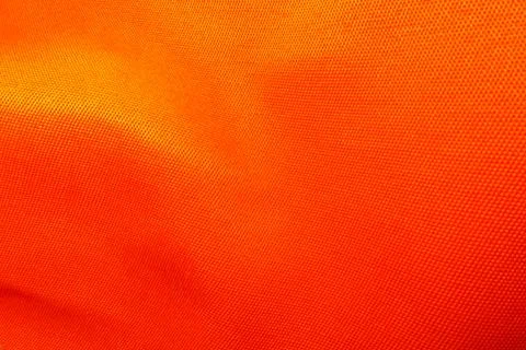 Orange fabric texture background for text or image Stock Photos
