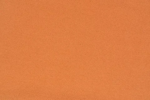 Orange fabric texture with clear diagonal woven pattern. Cotton textile bac.. 写真素材