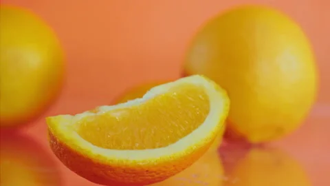 Orange fall into the water on  background Super slow-mo 1000 fps Stock Footage 163961528