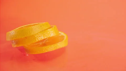 Orange fall into the water on  background Super slow-mo 1000 fps Stock Footage 163961805