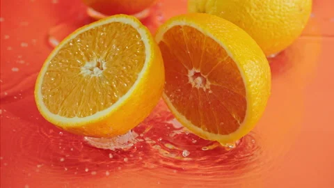 Orange fall into the water on  background Super slow-mo 1000 fps Stock Footage 163961845