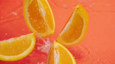 Orange fall into the water on  background Super slow-mo 1000 fps Stock Footage 163961998