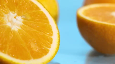 Orange fall into the water on  background Super slow-mo 1000 fps Stock Footage 163962048