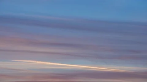 Orange feather clouds at sunrise - timelapse Stock Footage 163805722