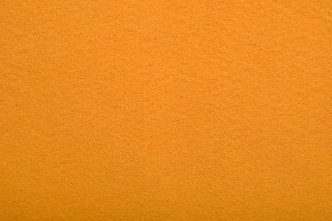 Orange felt texture background - close-up of soft fabric surface. Stock Photos