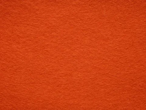 Orange felt texture. Saturated background for Christmas desktop, holiday New 写真素材