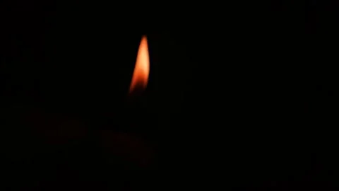 Orange fire in the dark in blur, bluer. Burning flame on blurred background. Stock Footage 278122145