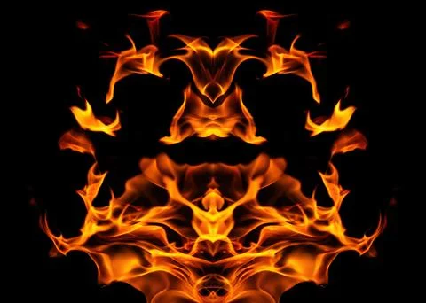 Orange fire flames on a black background Stock Photos