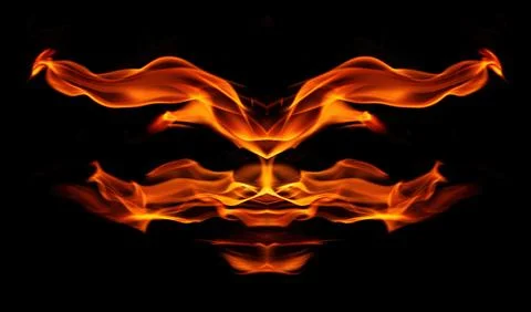 Orange fire flames on a black background 스톡 사진