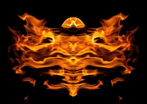 Orange fire flames on a black background Stock Photos