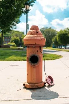 Orange Fire Hydrant Missing Cap Stock Photos