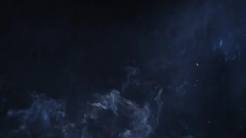 Orange fire sparks and clouds of smoke flying on black background Vídeos de archivo 329920293