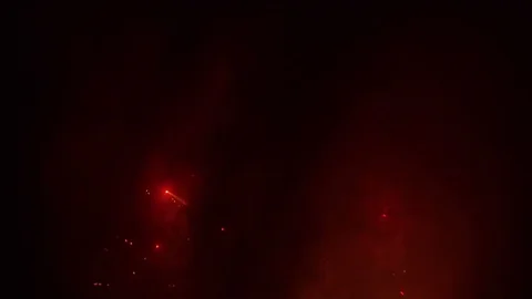 Orange Fireworks Behind Smoke Cloud Video stock 81343482