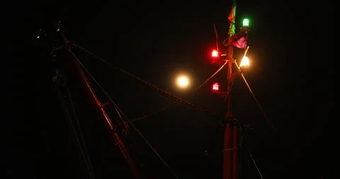 Orange Flag on Boat Night Stock Footage 279953698