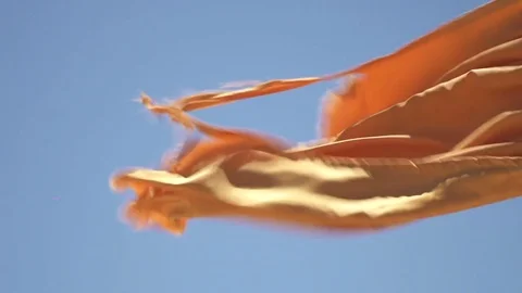 Orange flag waving in the wind. Stock Footage 84736918