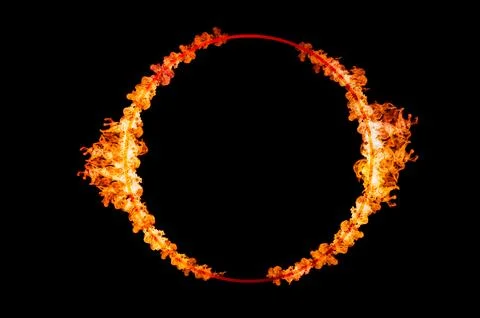 Orange flame circle frame on black background Stock Photos