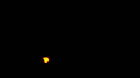 Orange Flame Clots Quickly Rushing in the Darkness Close up Stock Footage 66425453