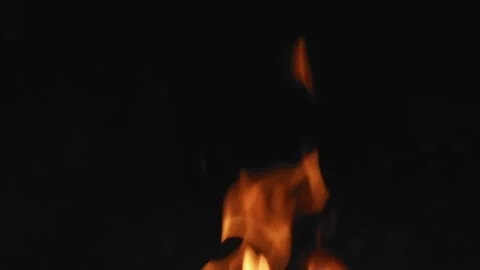 Orange flames burning on black background copy text space slow motion. Close up Stock Footage 140598879