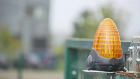 Orange flashing beacon on automatic gate Stock Footage 71167260