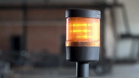 Orange flashing lamp of cnc machine tool in production Stock Footage 120416446