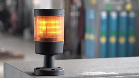 Orange flashing lamp of cnc machine tool in production Stock Footage 120519340