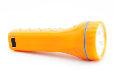 Orange flashlight isolated on white Stock Photos