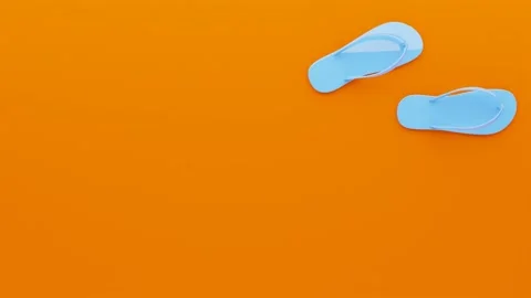Orange flip flops running over orange background, top view, 3d animation Stock Footage 198170379