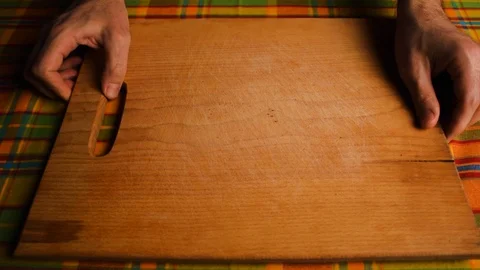 Orange fresh. Recipe. Man's hand puts on cutting board table. 库存影片 123789755