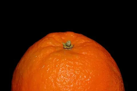 Orange fruit on a black background close up Stock-Fotos