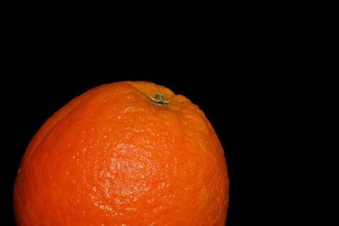 Orange fruit on a black background close up Stock-Fotos