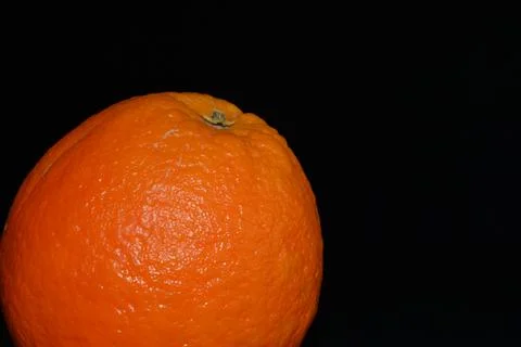 Orange fruit on a black background close up Stock-Fotos