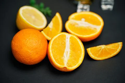 Orange fruit on black background. Stock-Fotos