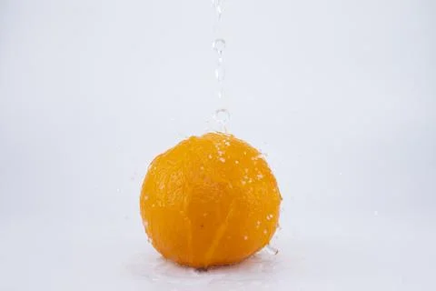 Orange fruit isolate. Orange citrus with drops on white background Stock Photos