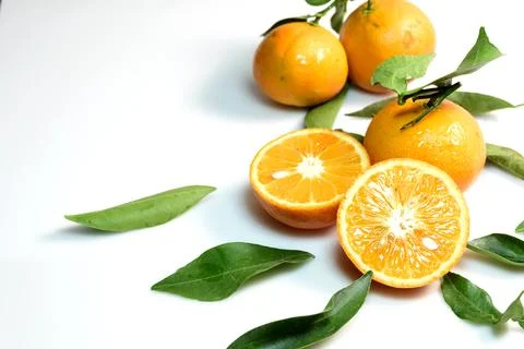 Orange Fruit with Leaves Stock Photos